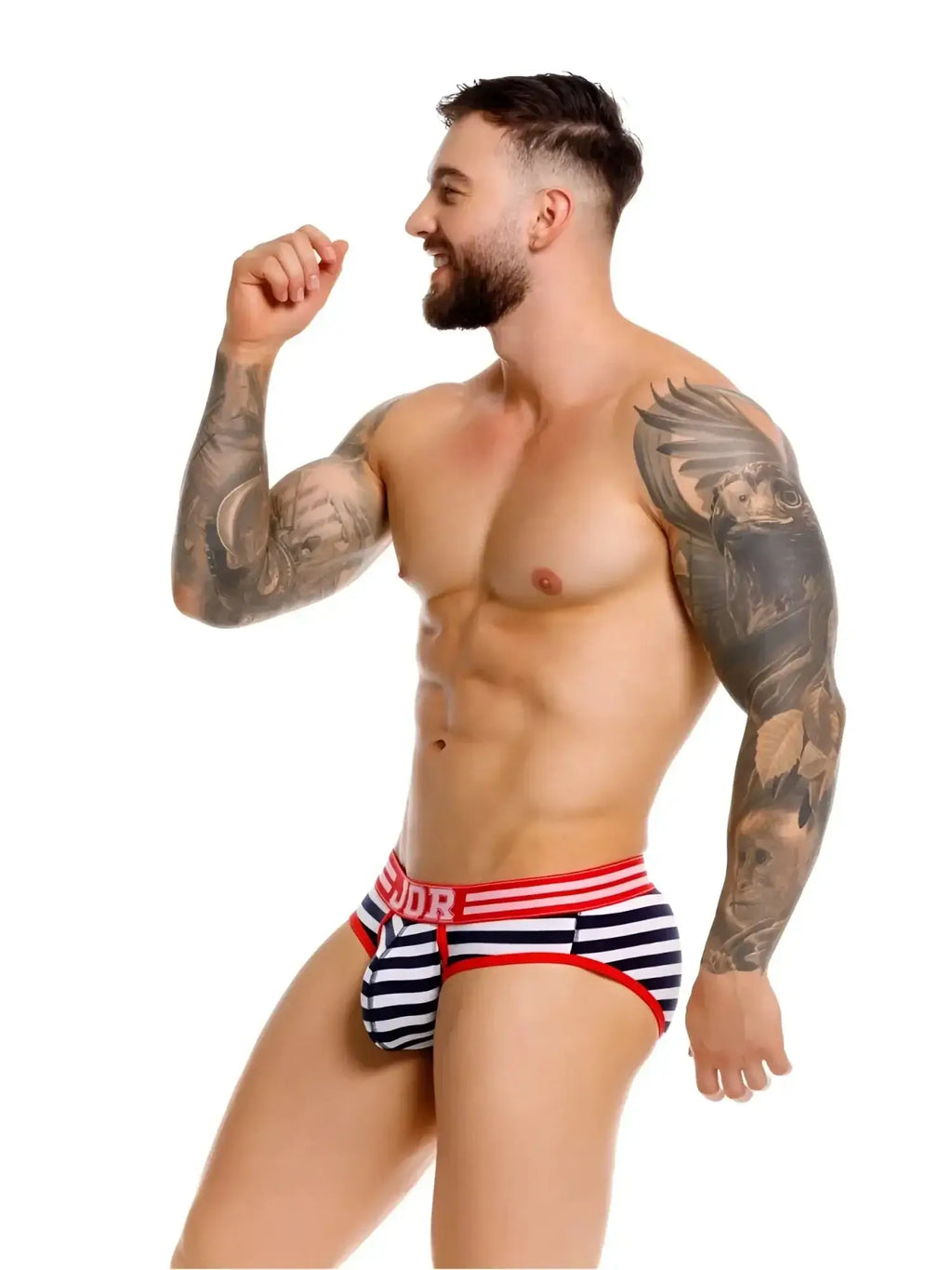 Side view of a man modeling JOR 2335 Santorini briefs in stripe print.
