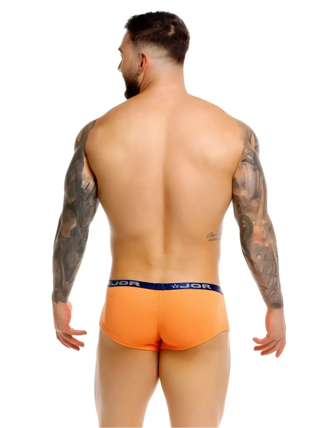 Back view of a man wearing JOR 2345 Cannes trunks in orange.