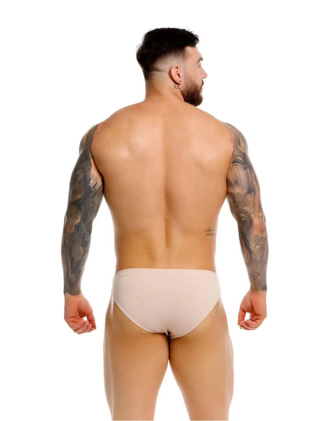 JOR 2348 Invisible Bikini in beige, rear view showing a man wearing the underwear against a white background.