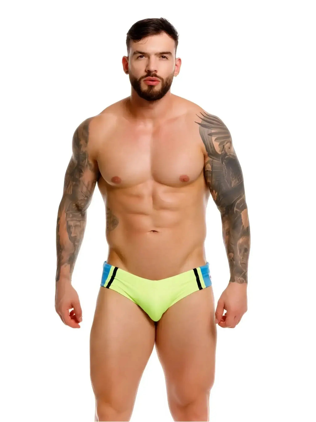 Front view of a model wearing JOR 2384 Wind green swim briefs.
