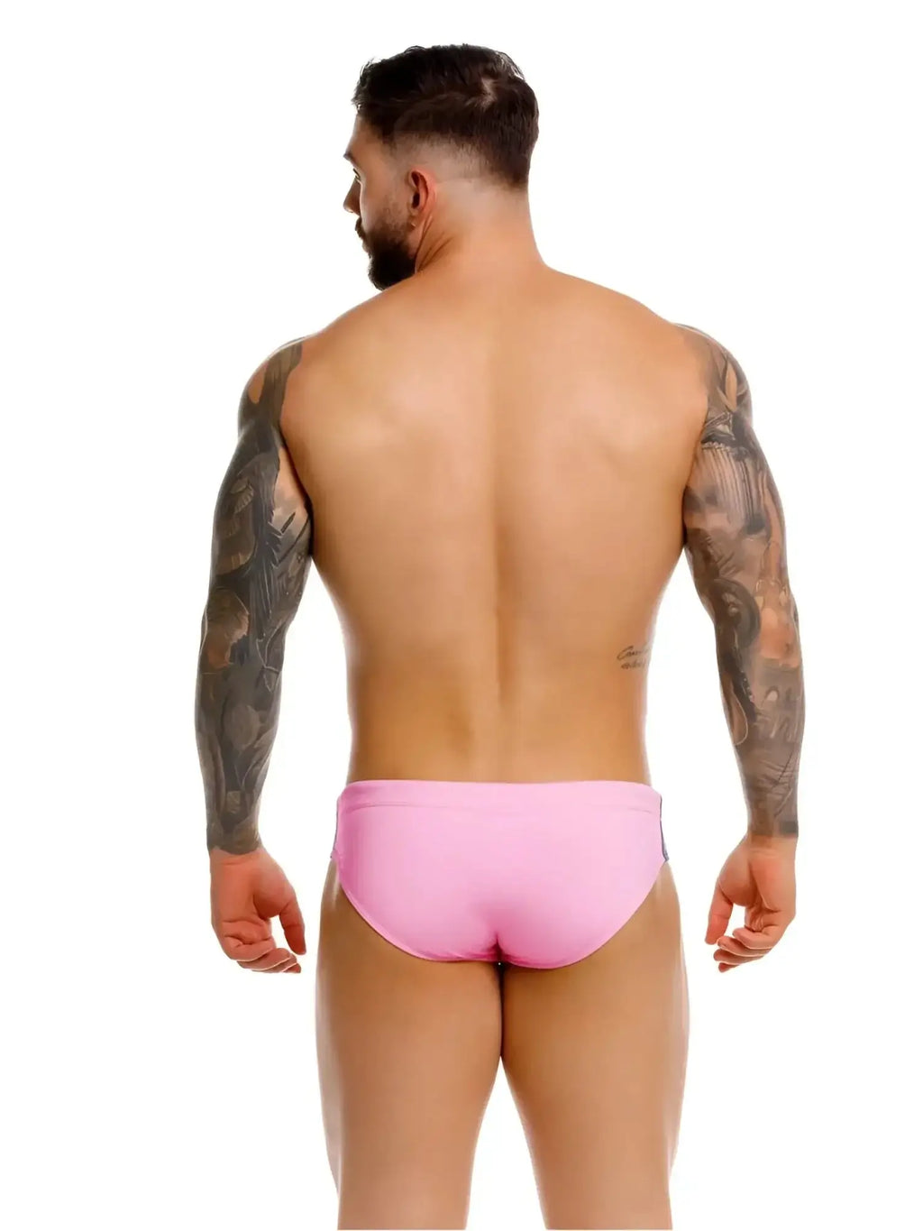 Back view of JOR 2384 Wind Swim Briefs in pink worn by a muscular man.