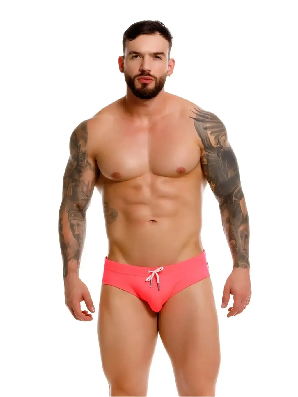 Front view of JOR 2387 Travel Swim Briefs in Candy pink on a shirtless model.
