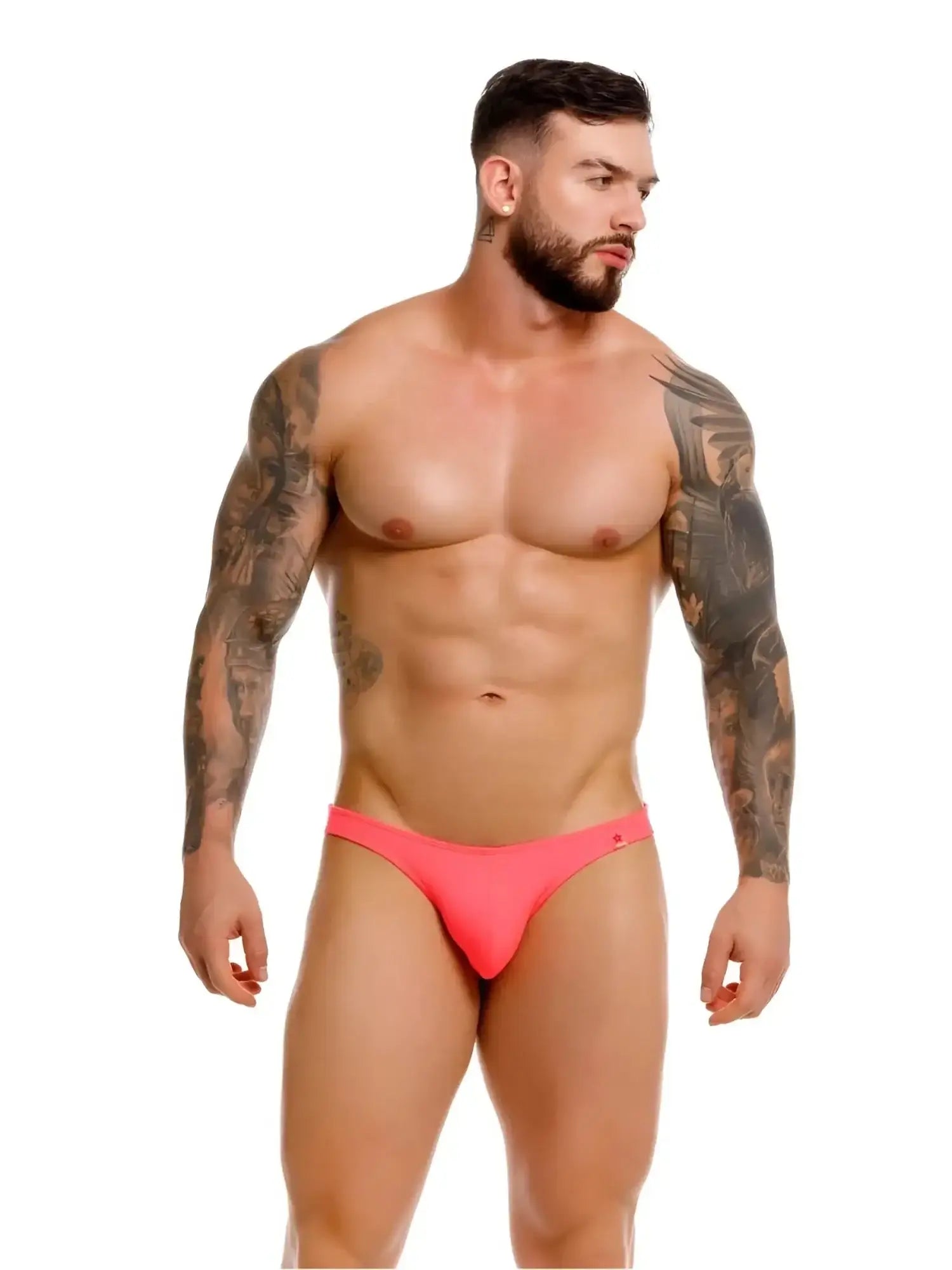 JOR 2389 Travel Swim Thongs in Candy. Front view of a model wearing neon pink swimwear.
