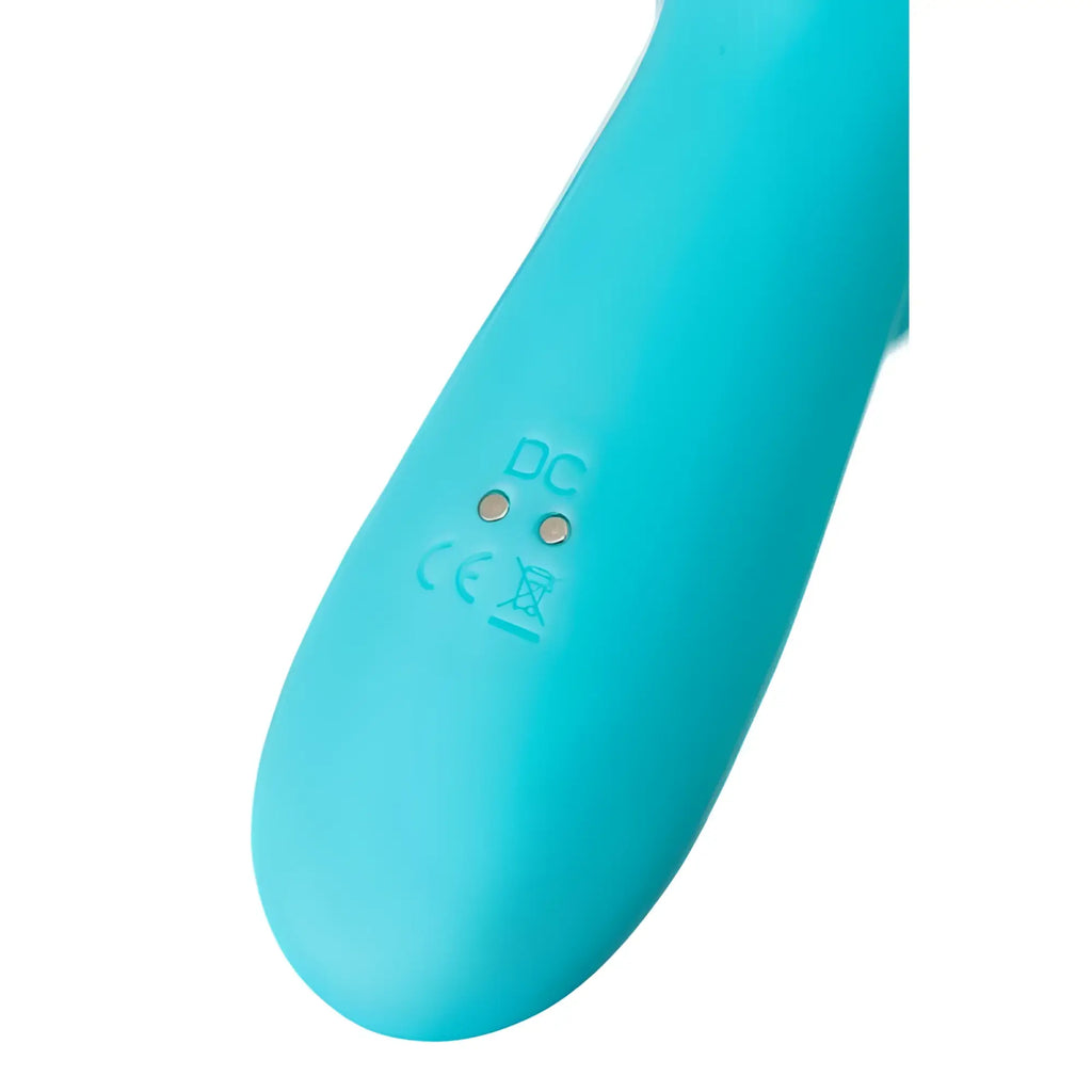 A sleek turquoise silicone-handled jos jos merry swirl rotating shaft rabbit vibrator with dc and ce marks