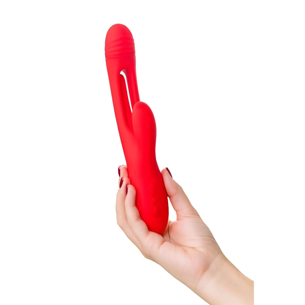 A vibrant red jos jos patti moving tongue rabbit vibrator with smooth silicone finish and ergonomic contours