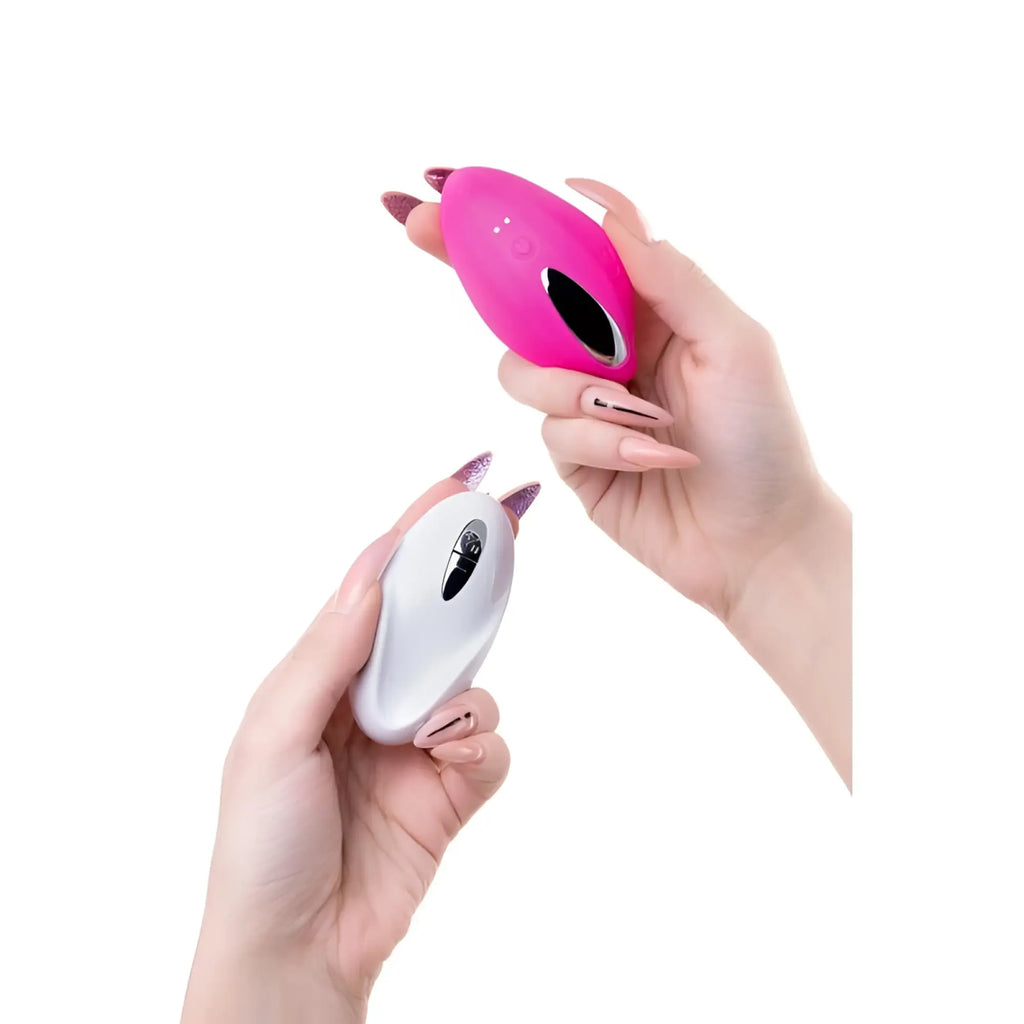 JOS JOS Rumba wearable vibrator a sleek ergonomic pink and white silicone vibrator with a glossy finish