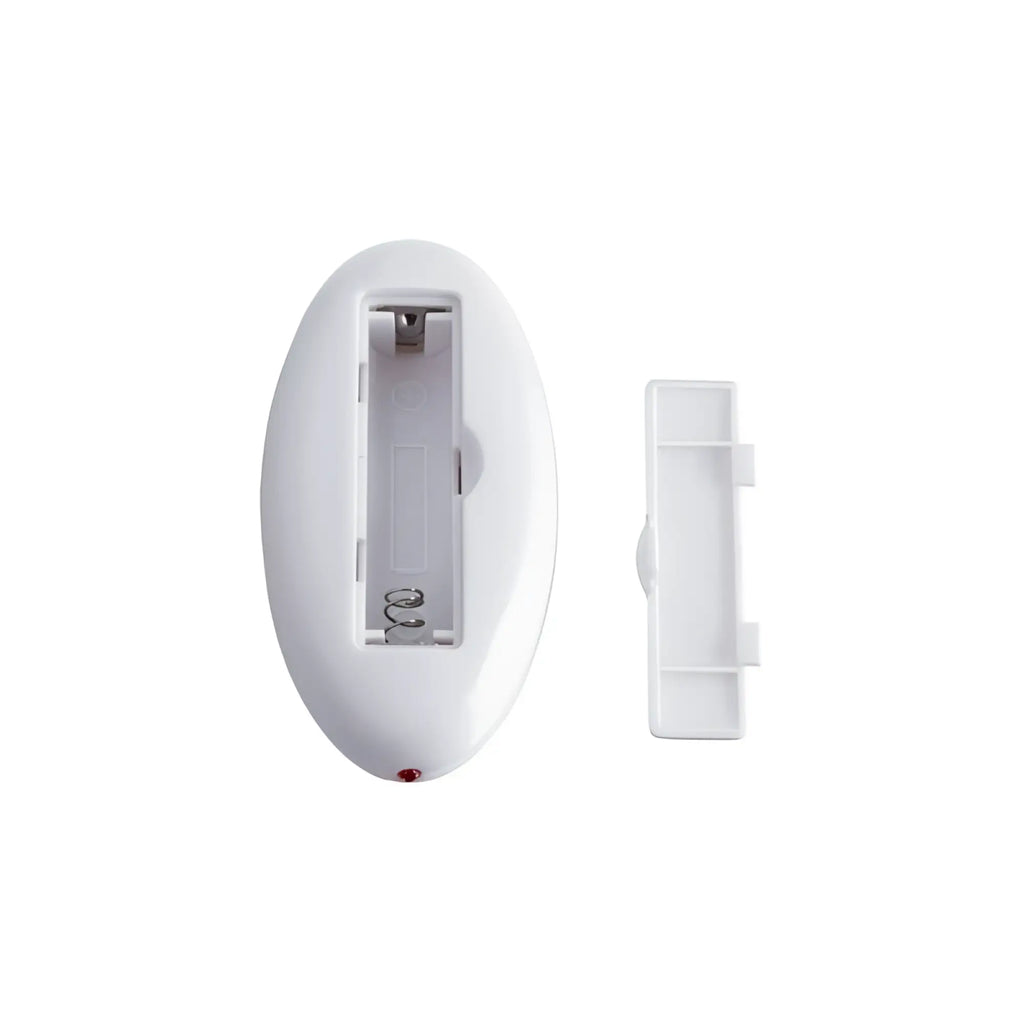 White oval battery compartment cover with matching lid on the back of jos jos rumba wearable vibrator for easy access