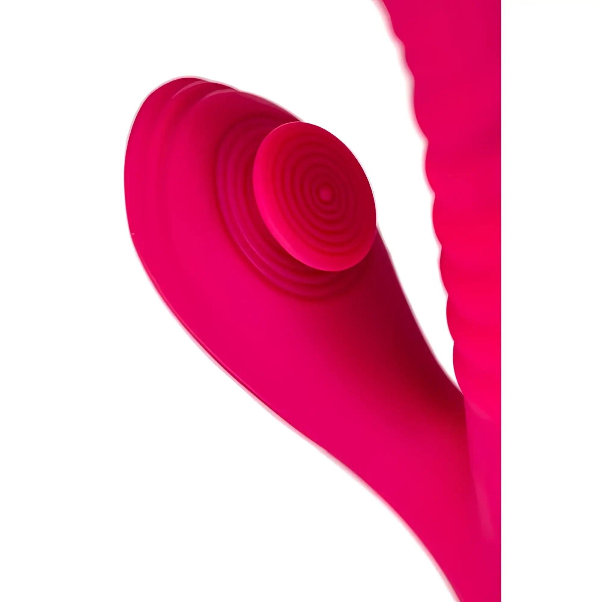 Vibrant pink silicone jos jos seri thrusting vibrator with textured circular head and curved body with clitoral stimulator pad