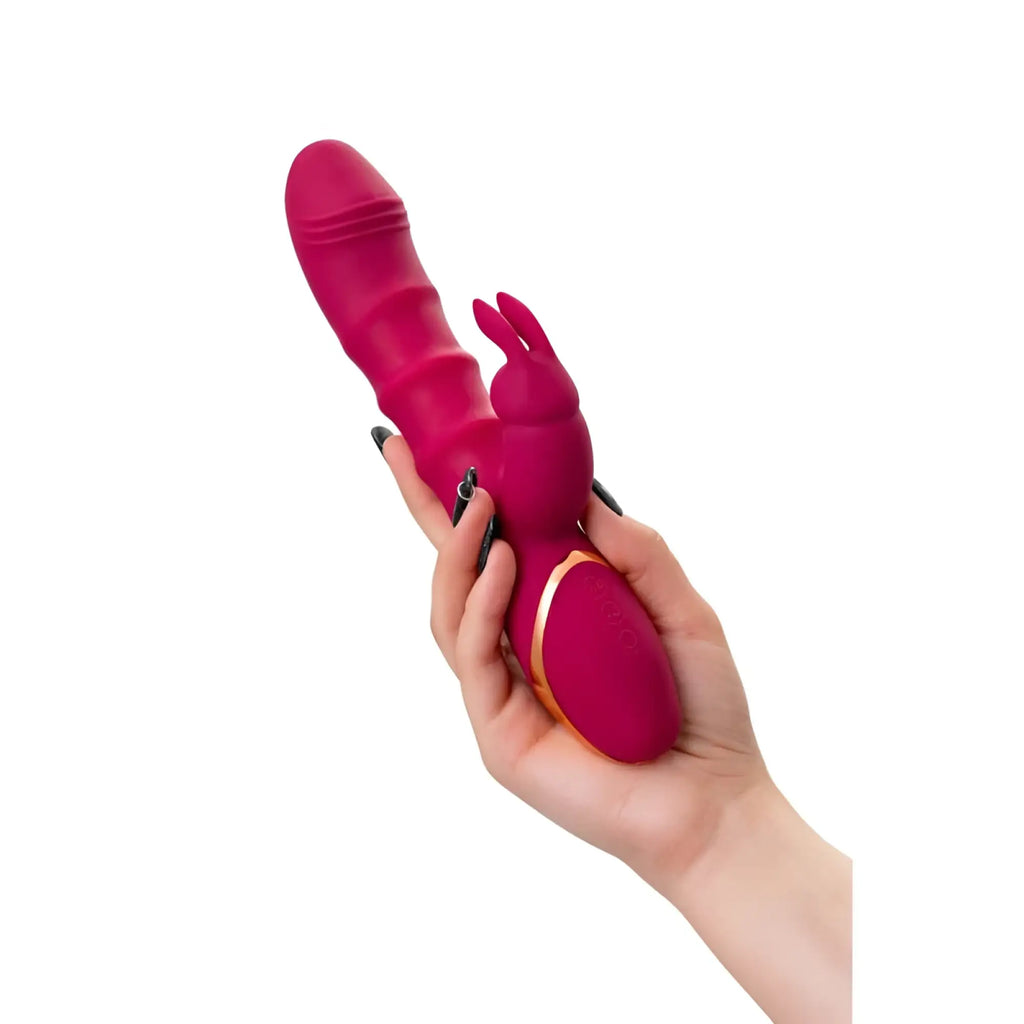 A vibrant magenta silicone JOS JOS Tenty rabbit vibrator with bunny head design and gold-accented control panel