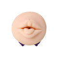 Beige silicone jos jos yara masturbator toy with realistic lips and small opening mounted on purple plastic feet