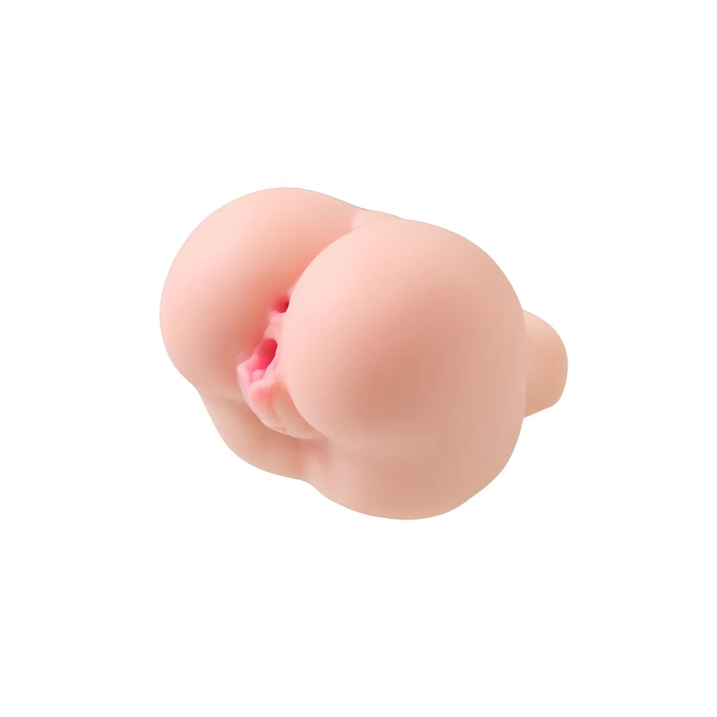 Pink silicone anal plug juicy juicy butt masturbator paula with textured flesh tone and subtle red detailing at opening