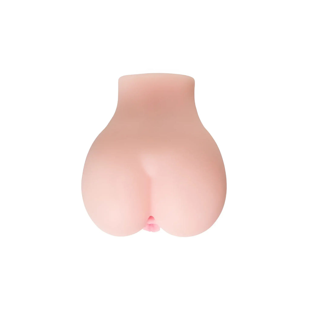 A realistic flesh-toned silicone butt plug with smooth glossy finish and subtle contours from juicy juicy butt masturbator paula