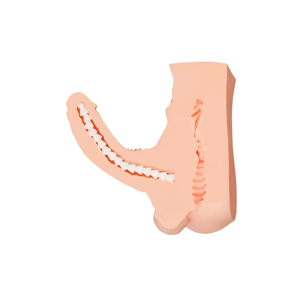 Peach-colored silicone boot-shaped mold with white interior and stitched texture for juicy juicy long schlong manuel product