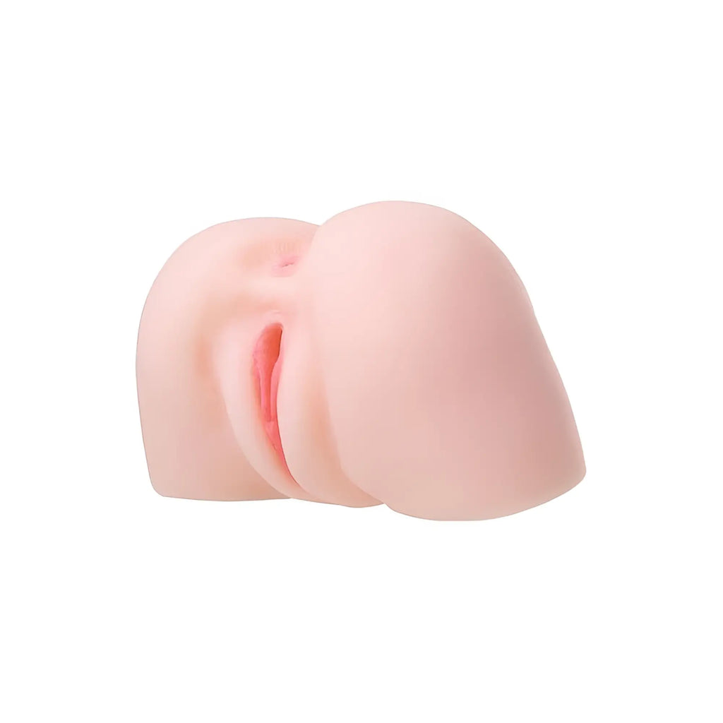 Pink silicone anal plug with smooth realistic texture and subtle pink interior lining from Juicy Juicy Pussy Masturbator Adele