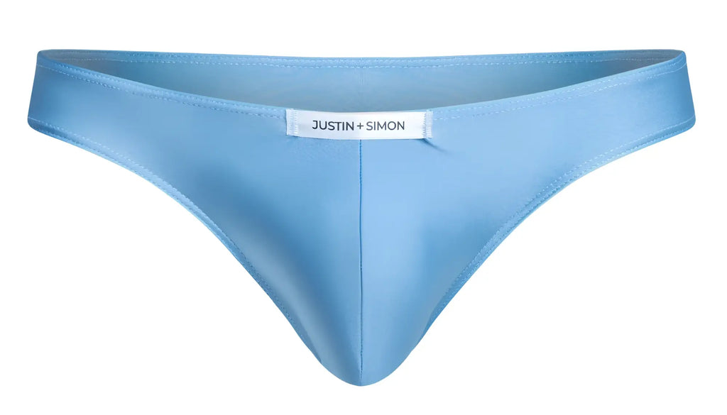 Light blue satin thong from justin simon classic bikini xsj01 in baby blue showing front view