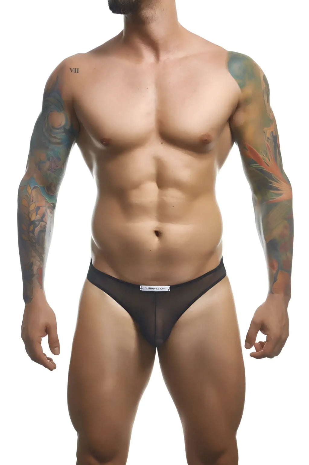 Black mesh briefs with a white waistband label from justin simon classic bikini xsj01 collection