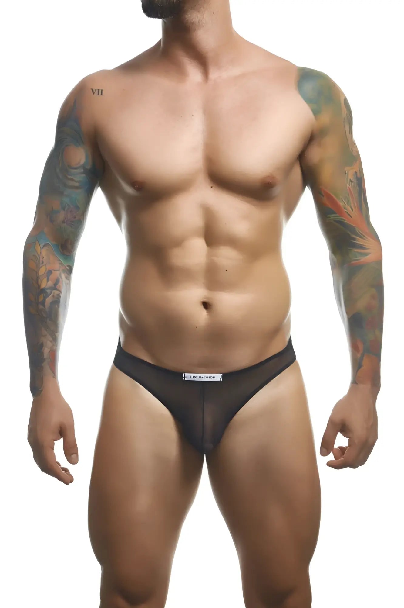 Black mesh briefs with a white waistband label from justin simon classic bikini xsj01 collection