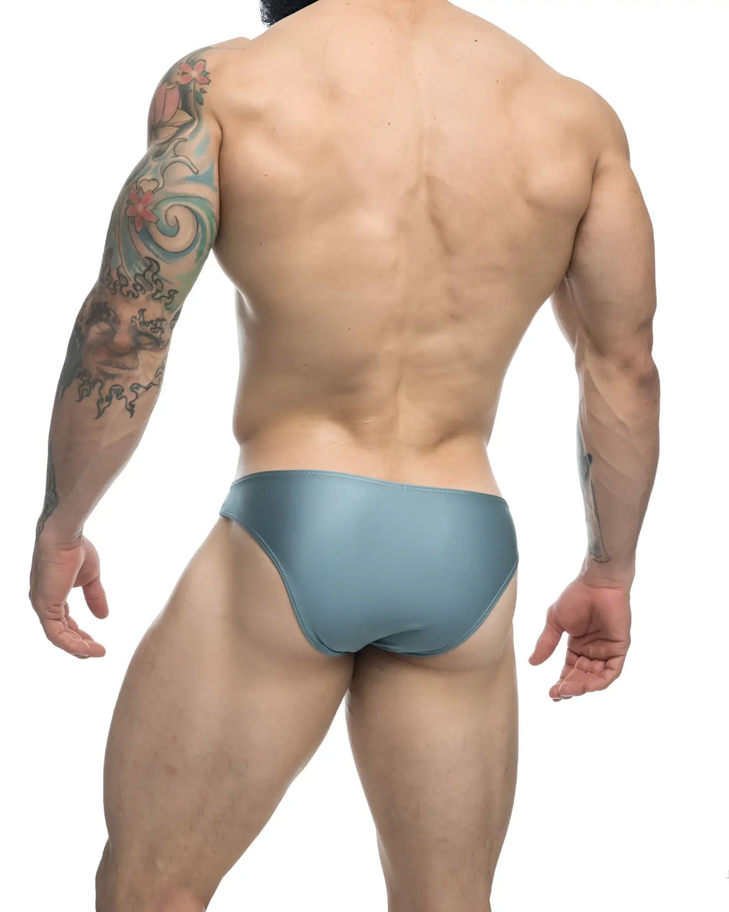 A sleek teal classic bikini swim brief with a smooth satin finish from JUSTIN SIMON XSJ01 in metal green