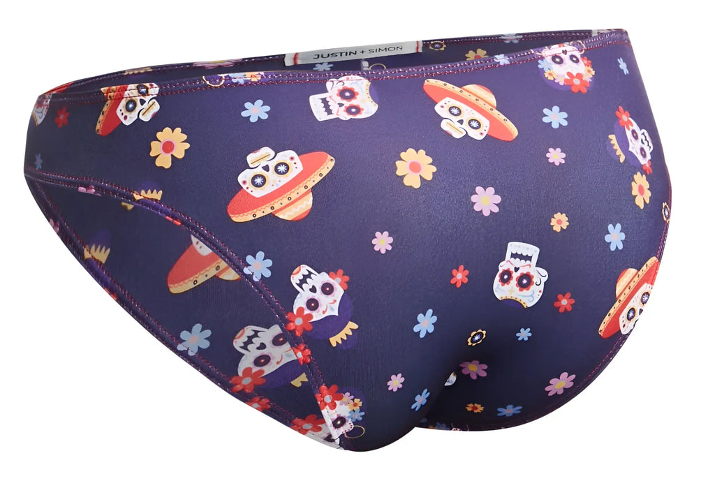 Dark purple justin simon xsj01 classic bikini swim trunks with vibrant sugar skull and ufo pattern from mexico