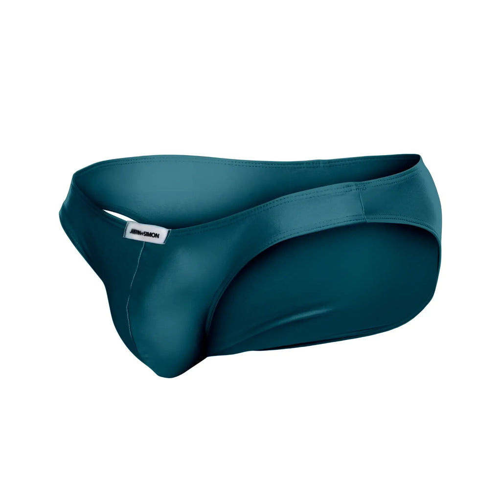 Teal satin briefs with sleek form-fitting design and subtle brand tag on waistband in justin simon classic bikini opal green