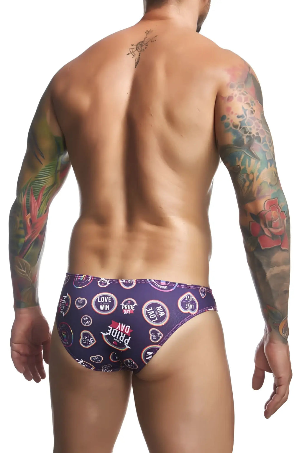 Purple patterned swim trunks with love win pride day text and heart motifs from justin simon xsj01 classic bikini color pride