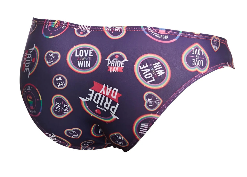 Purple JUSTIN+SIMON classic bikini swim trunks with vibrant rainbow pride day graphic pattern for pride celebration