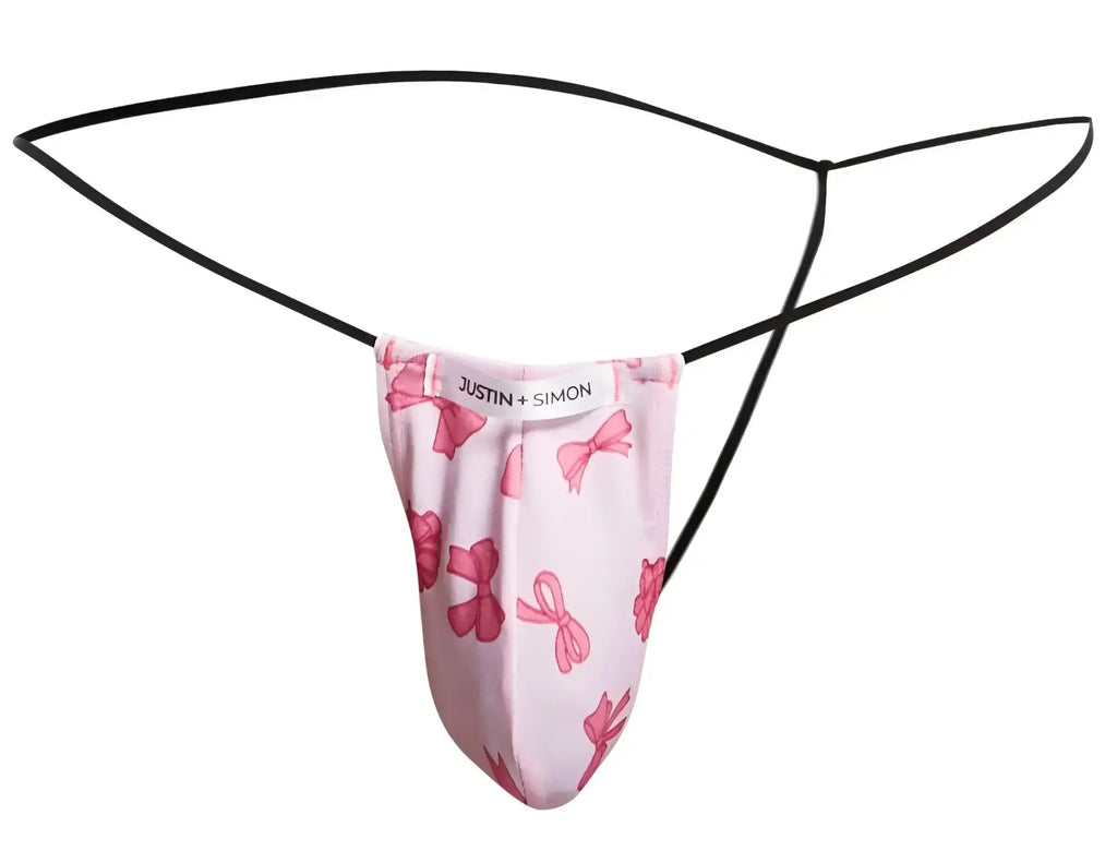 Pink bow-patterned thong with black elastic straps by justin simon in the justin simon xsj02 classic g-string collection