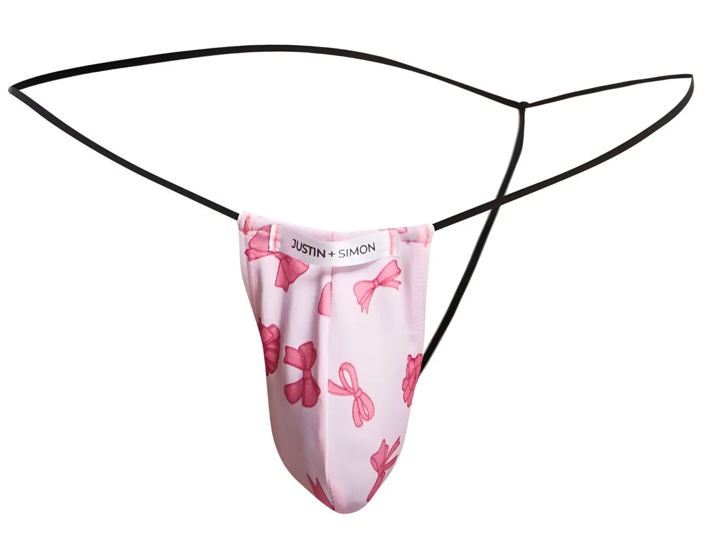 Pink bow-patterned thong with black elastic straps by justin simon in the justin simon xsj02 classic g-string color coquette collection