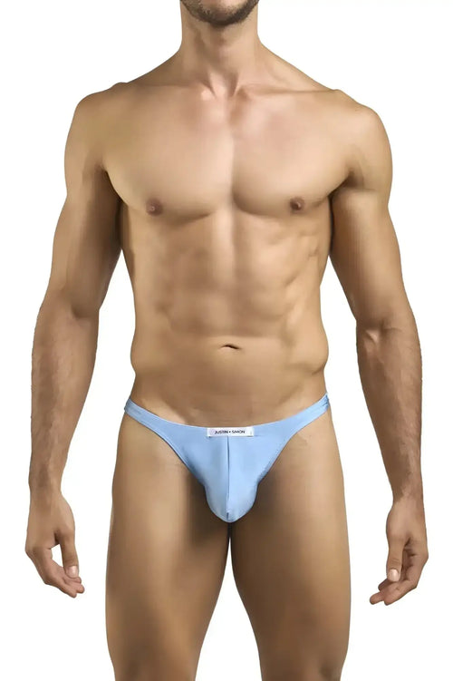 Light blue classic thongs by Justin Simon with a form-fitting design and subtle brand tag at the waistband