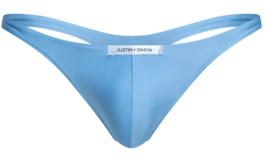 Light blue satin thong with white justin simon label on the back in the classic baby blue xsj03 style