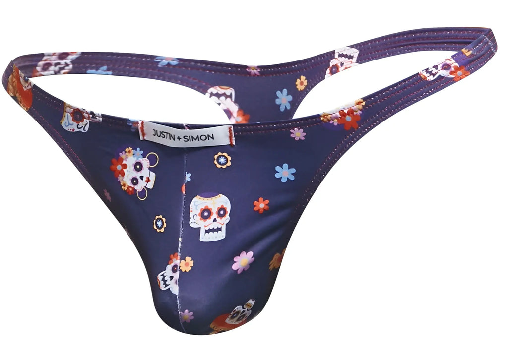 Dark blue classic thong with vibrant sugar skull floral pattern and justin simon brand label in mexico colorway