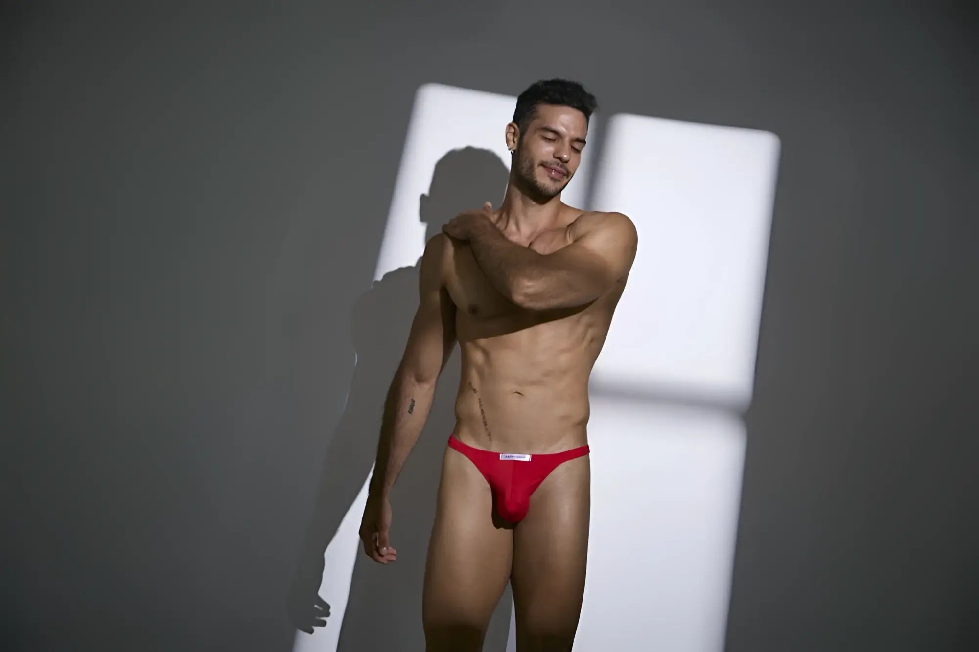 Justin Simon XSJ03 classic peach red briefs with white logo on waistband designed for comfortable everyday wear