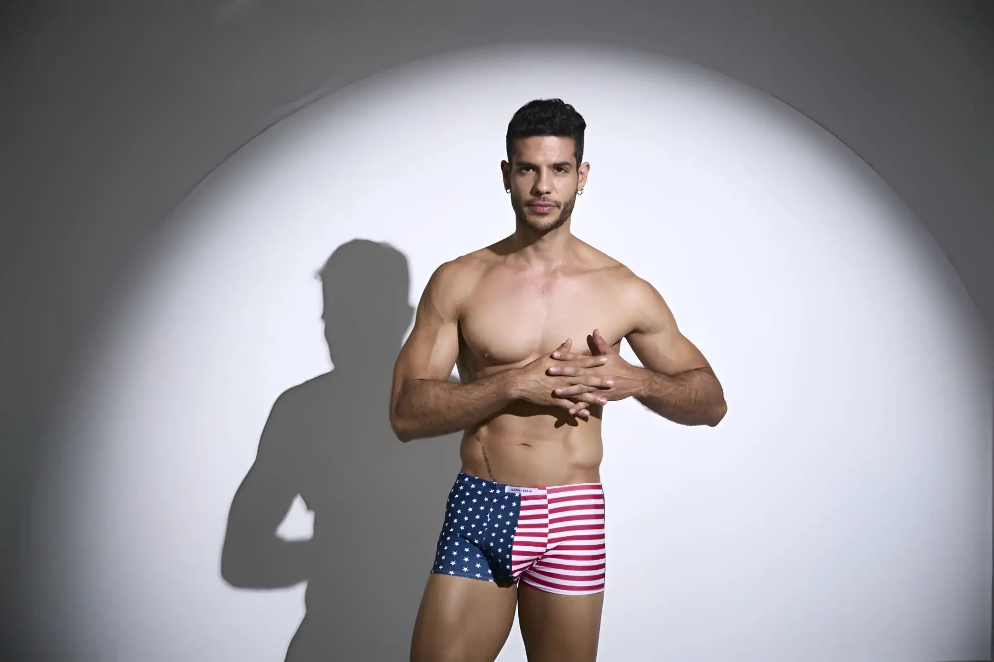 A man wearing justin simon xsj08 classic boxer briefs with usa flag pattern featuring stars and stripes