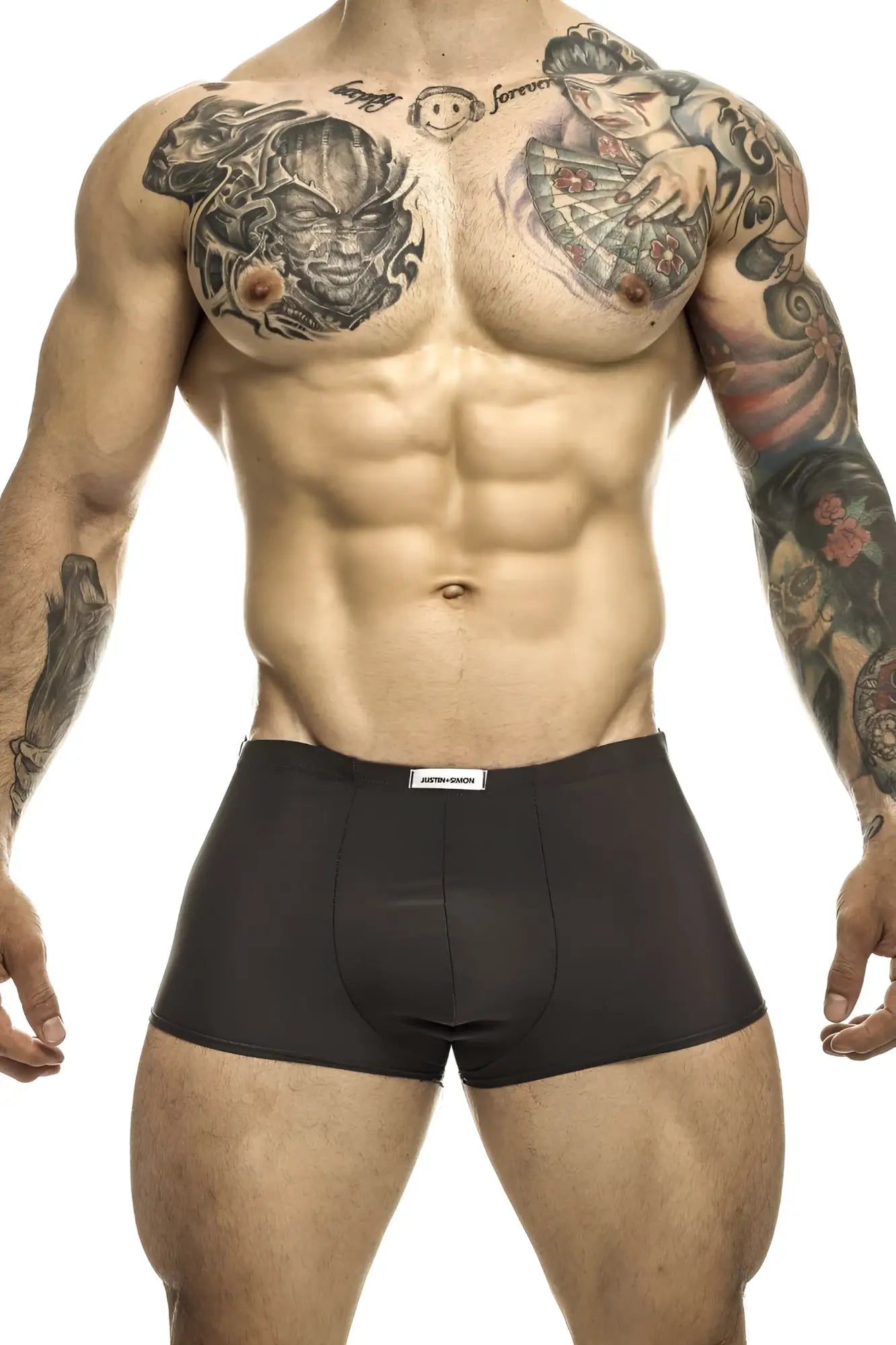 Black classic trunks by justin simon with a white waistband label in gray color for everyday comfort
