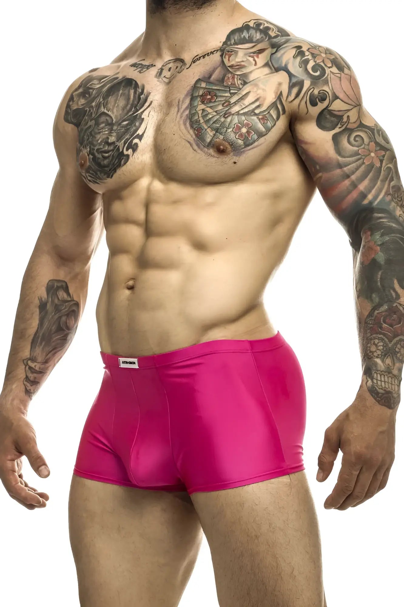 Bright pink shiny fabric briefs with a white brand tag on the waistband from justin simon xsj08 classic trunks collection