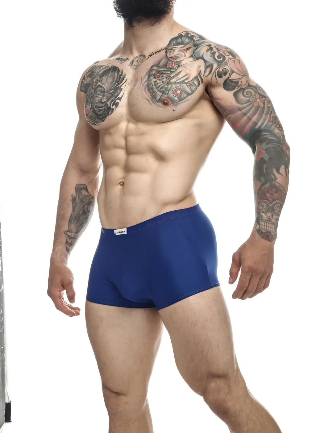 Royal blue justin simon xsj08 classic trunks with a small white brand tag on the waistband in men’s briefs style
