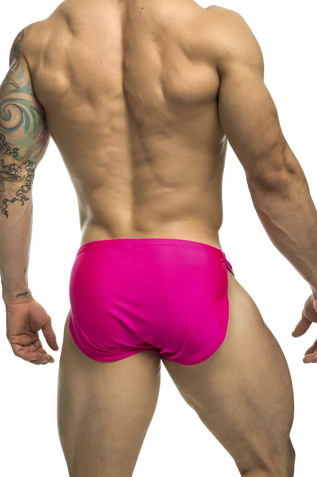 Bright pink justin simon xsj09 running shorts with snug form-fitting design ideal for active wear