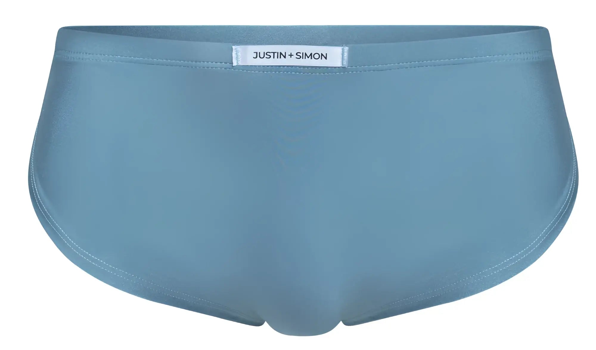 Light blue justin + simon briefs with smooth seamless fabric finish shown with xsj09 metal green running shorts