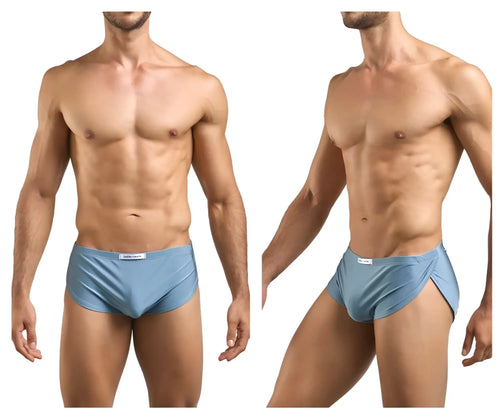 Light blue smooth textured men’s briefs with subtle side slit and white brand tag paired with justin simon xsj09 metal green running shorts