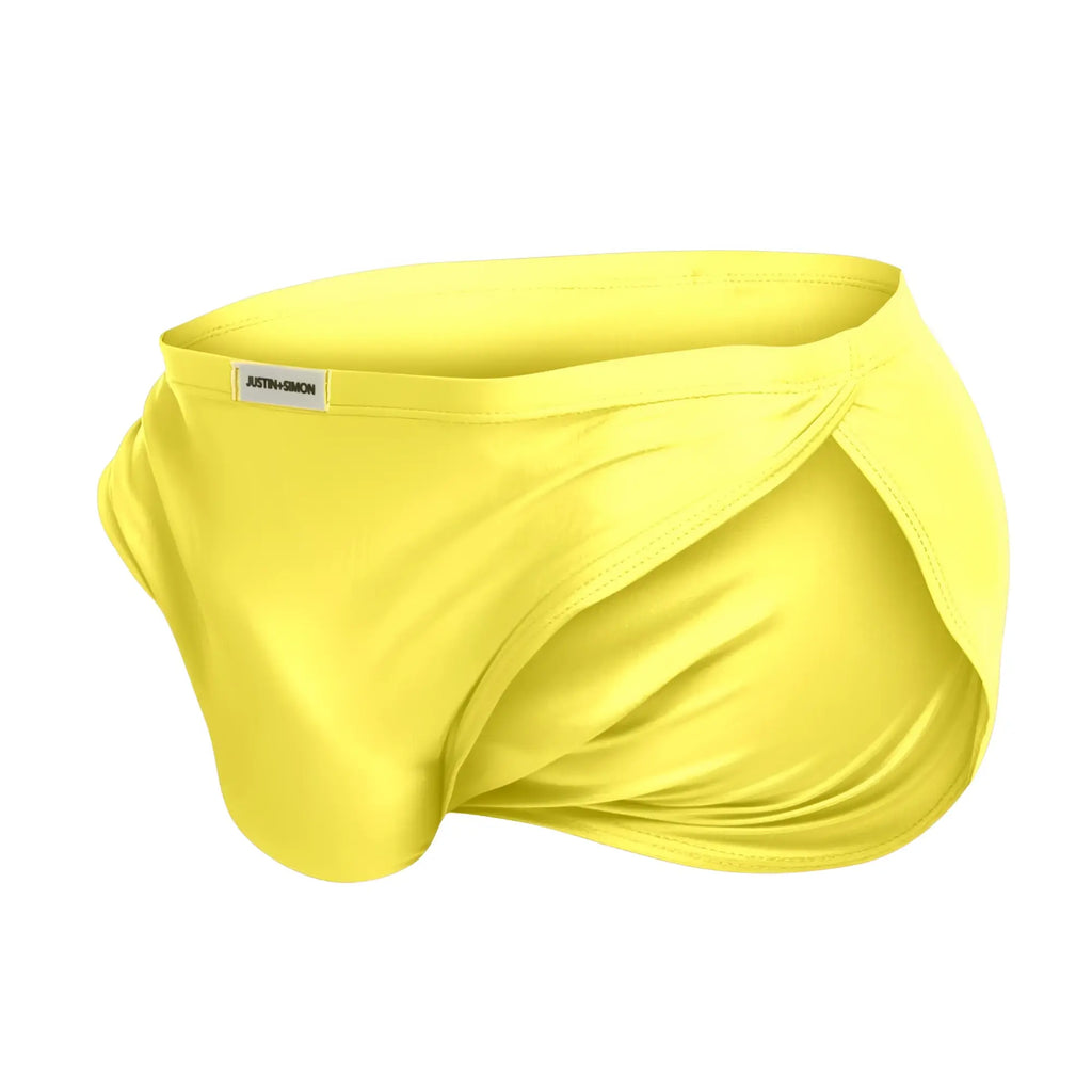 Bright yellow justin simon xsj09 running shorts with smooth texture and subtle waistband label for men