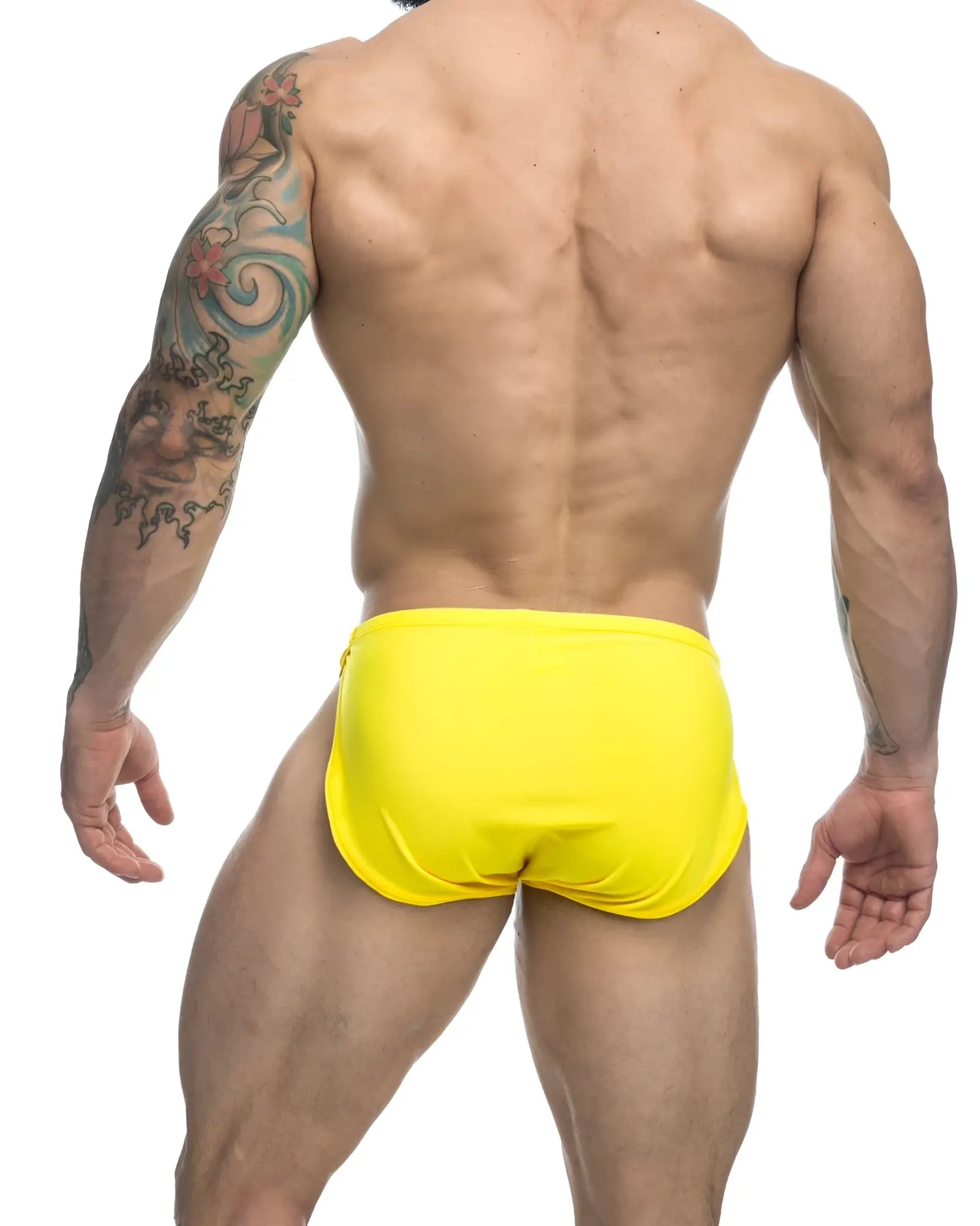 Bright yellow justin simon xsj09 running shorts made of lightweight fabric ideal for active wear