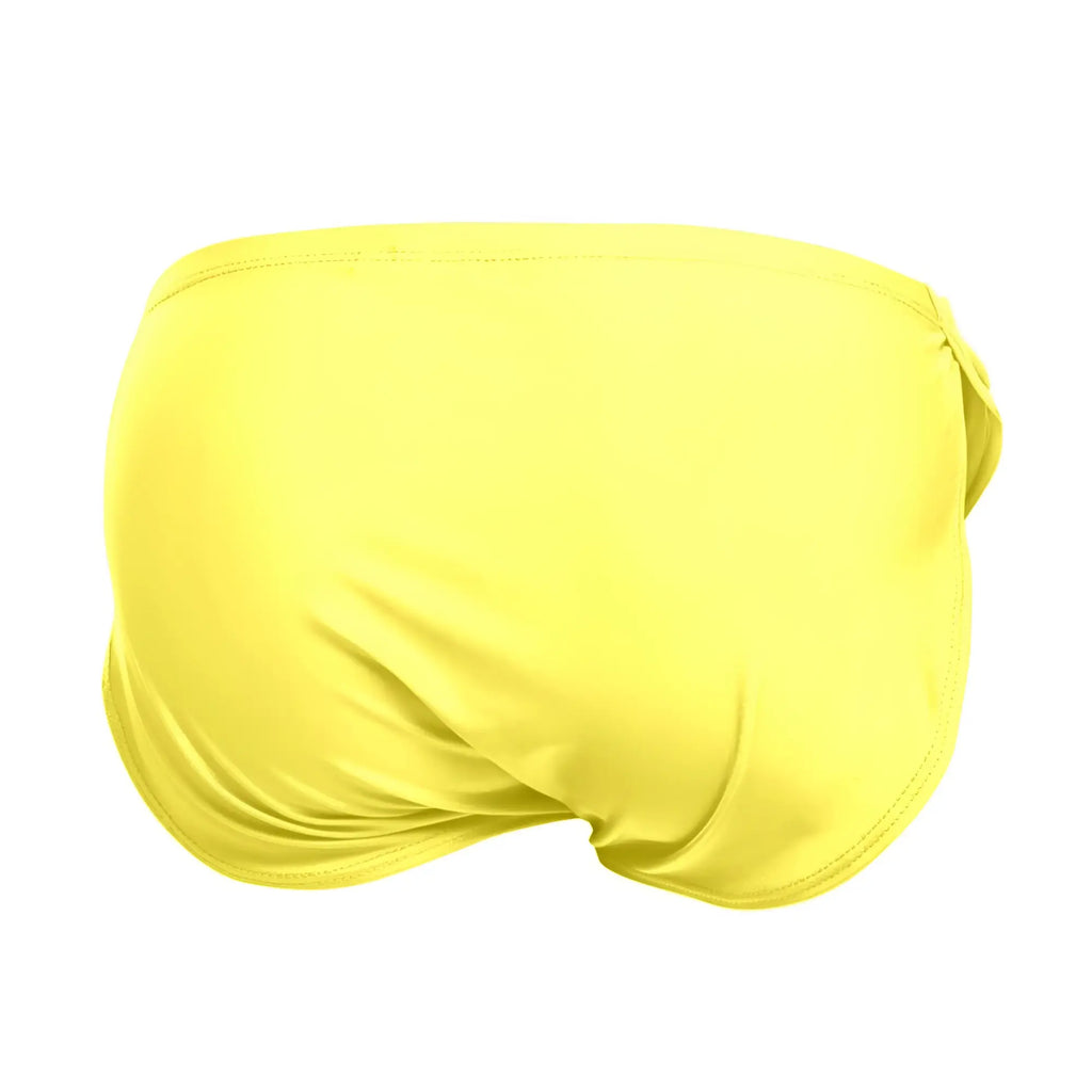 Bright yellow justin simon xsj09 running shorts made of smooth stretchy fabric with a simple seamless design