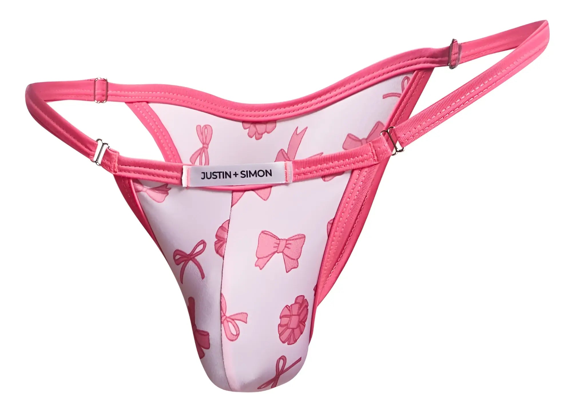 Pink bow-patterned thong bikini by justin + simon in coquette color showing front view