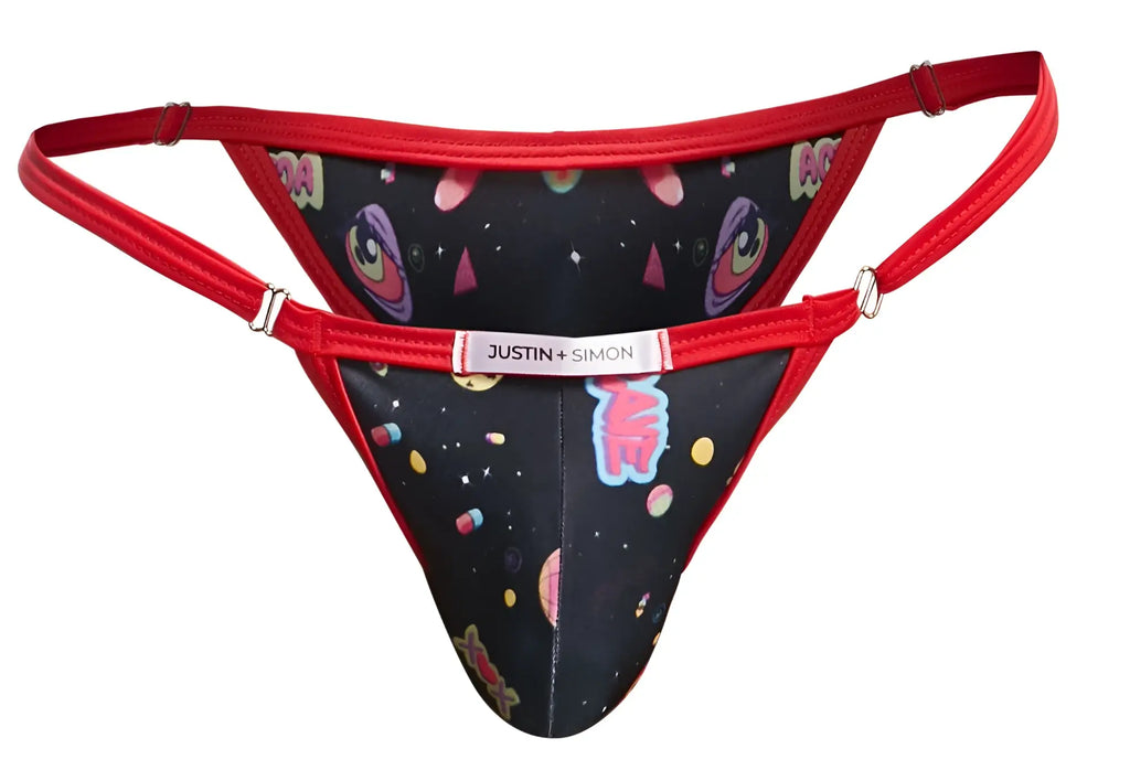 Red-trimmed bikini thong with black space-themed print featuring cartoon eyes, planets, and stars by justin simon