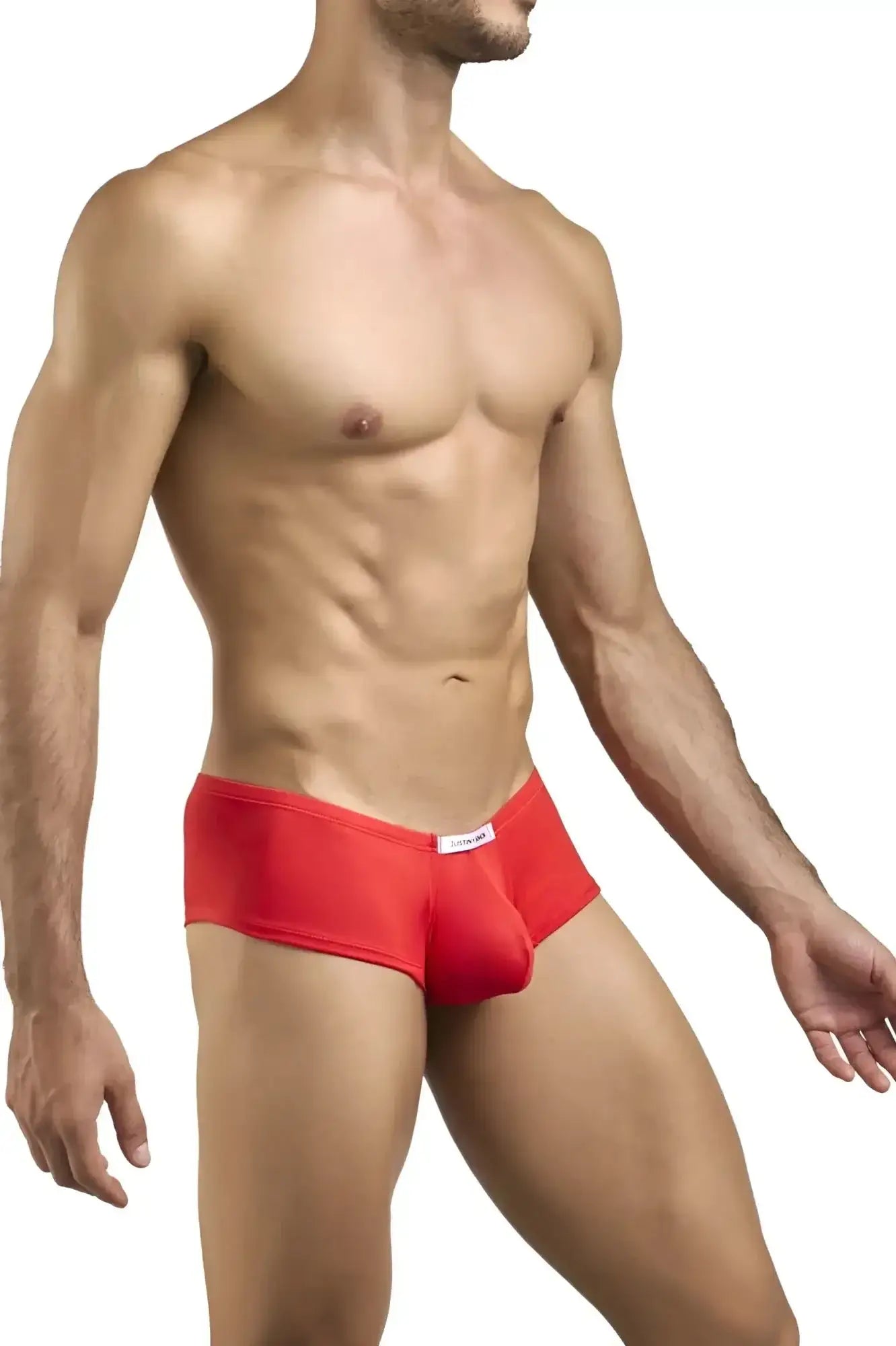 Red men’s cheeky bulge boxer briefs with a snug fit and small white waistband label in peach red by justin simon