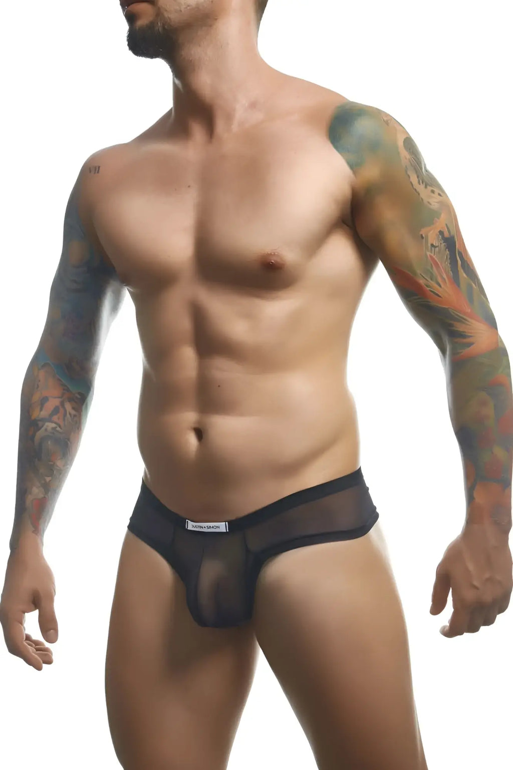 Black sheer mesh briefs with a solid black waistband and panasonic label from justin simon xsj22 cheek briefs collection