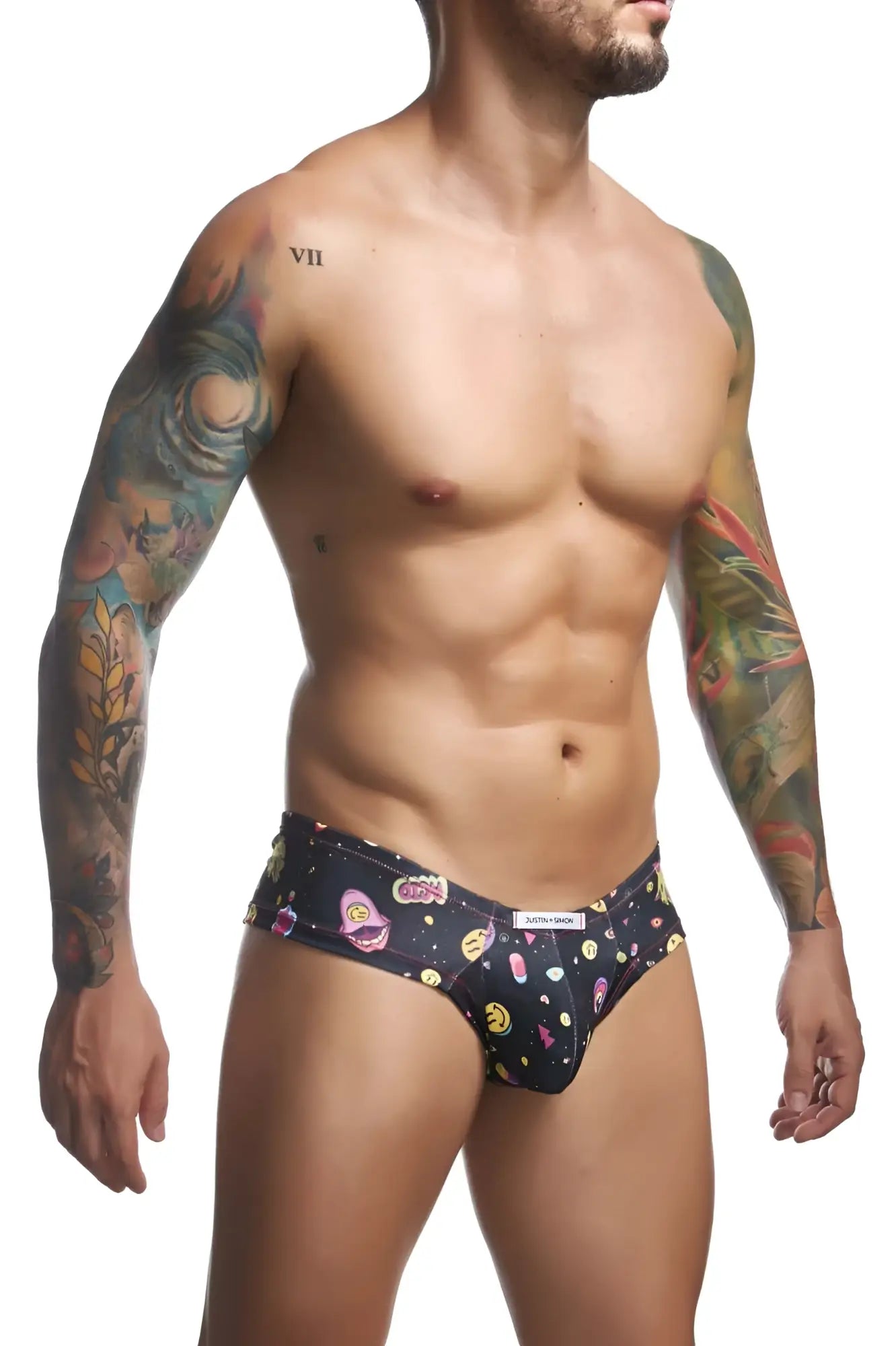 Black men’s briefs justin simon xsj22 cheek briefs in psychedelic color with colorful cartoon faces and space graphics pattern