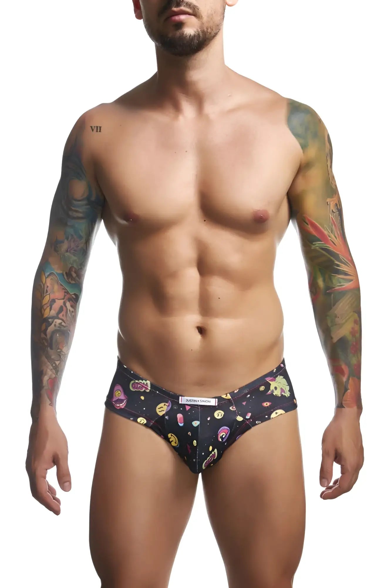 Black briefs from justin simon xsj22 cheek briefs color psycodelic featuring vibrant cartoon-themed pattern