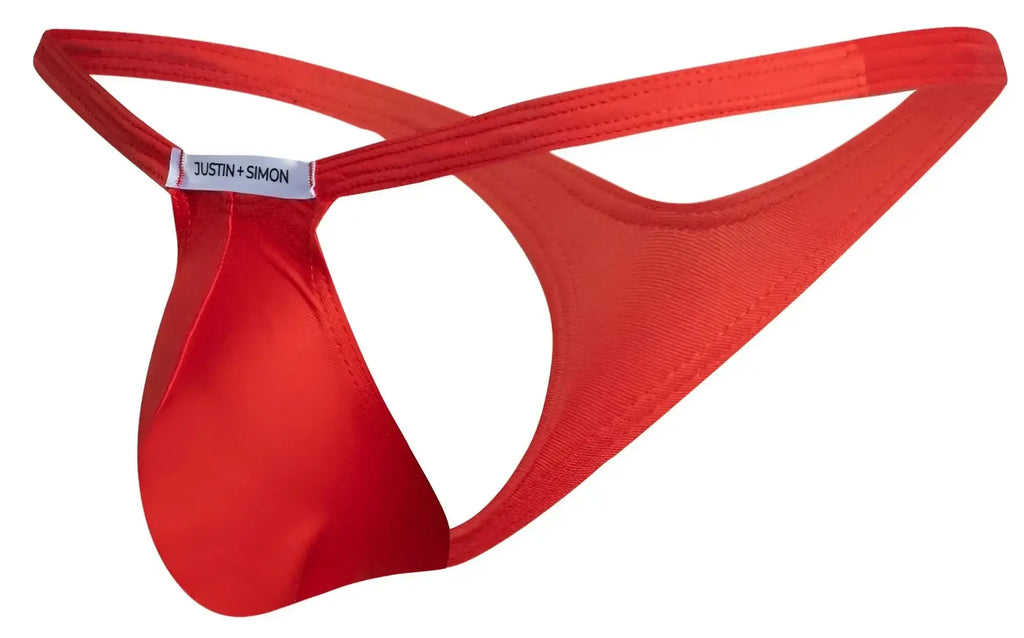 Red justin simon bulge thong made of smooth satin fabric with a minimalist design in peach red color