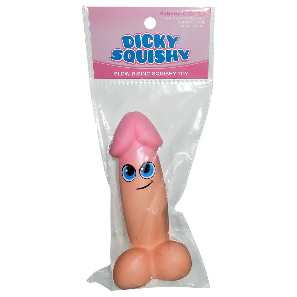 Kheper Games dicky squishy stress reliever is a pink banana-scented toy with blue eyes and a smiling face in clear packaging